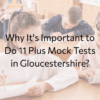 Children in a room taking an exam with black writing
